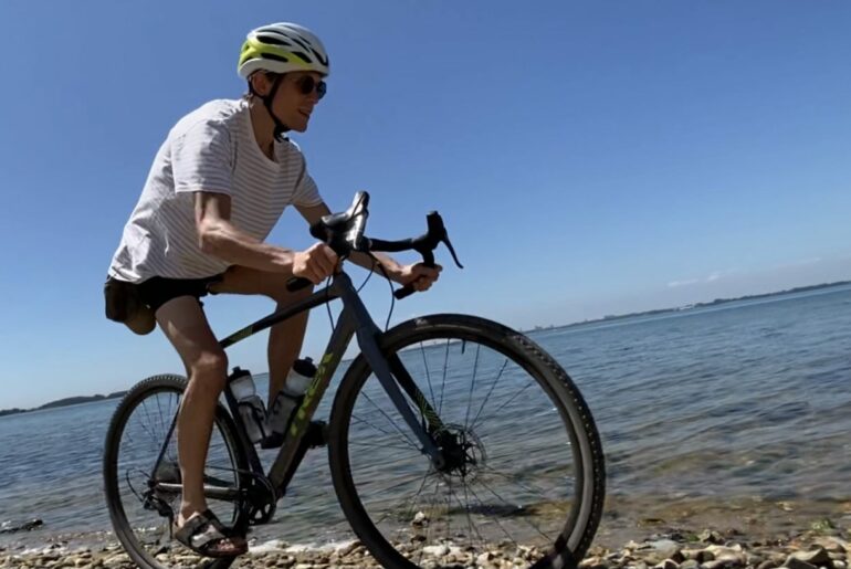The Joy of Gravel (Bikes) Gravel Bike being ridden on the beach
