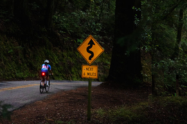 How can you cycle safely on country roads?